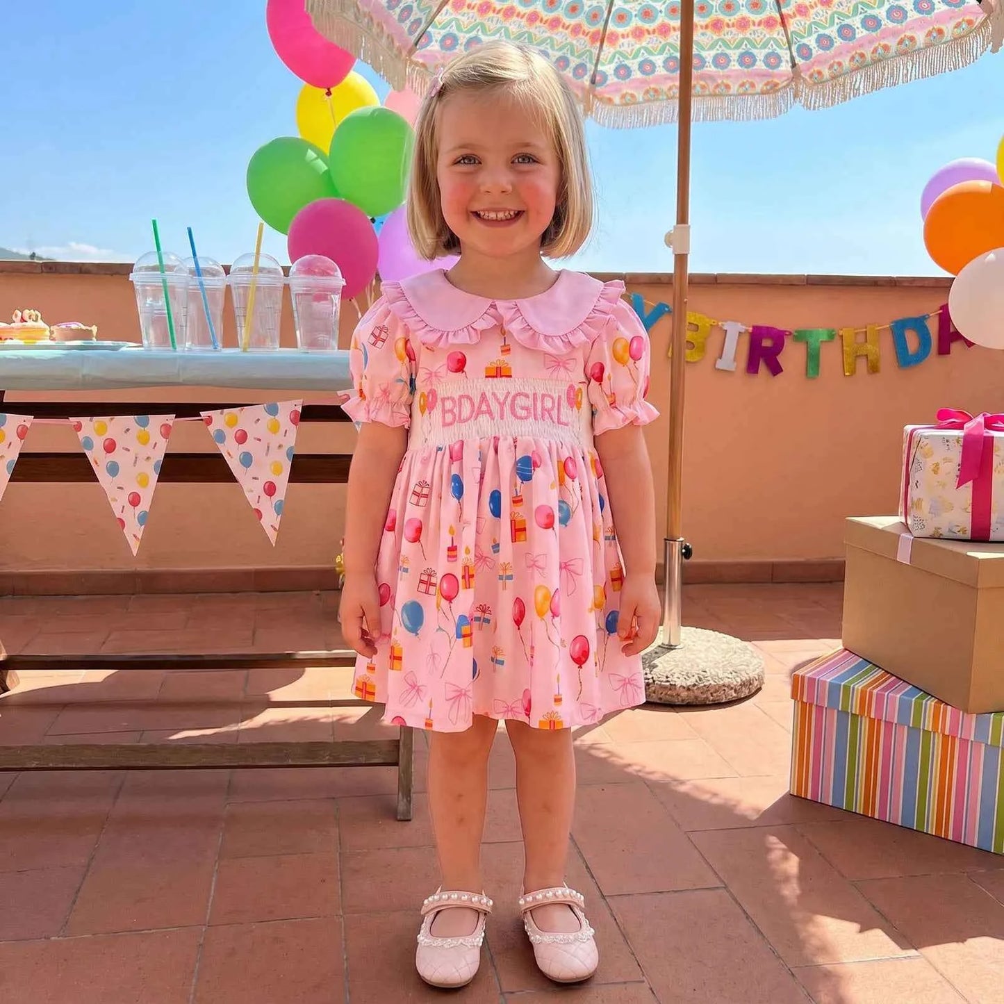 Cotton Pink Smocked Bday Dress With Balloon & Gift Print