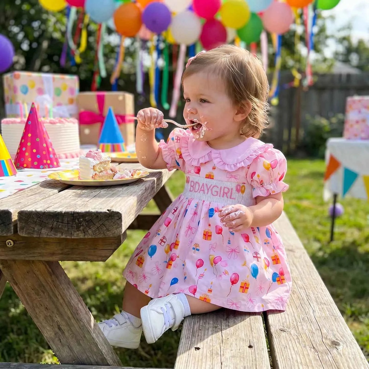 Cotton Pink Smocked Bday Dress With Balloon & Gift Print