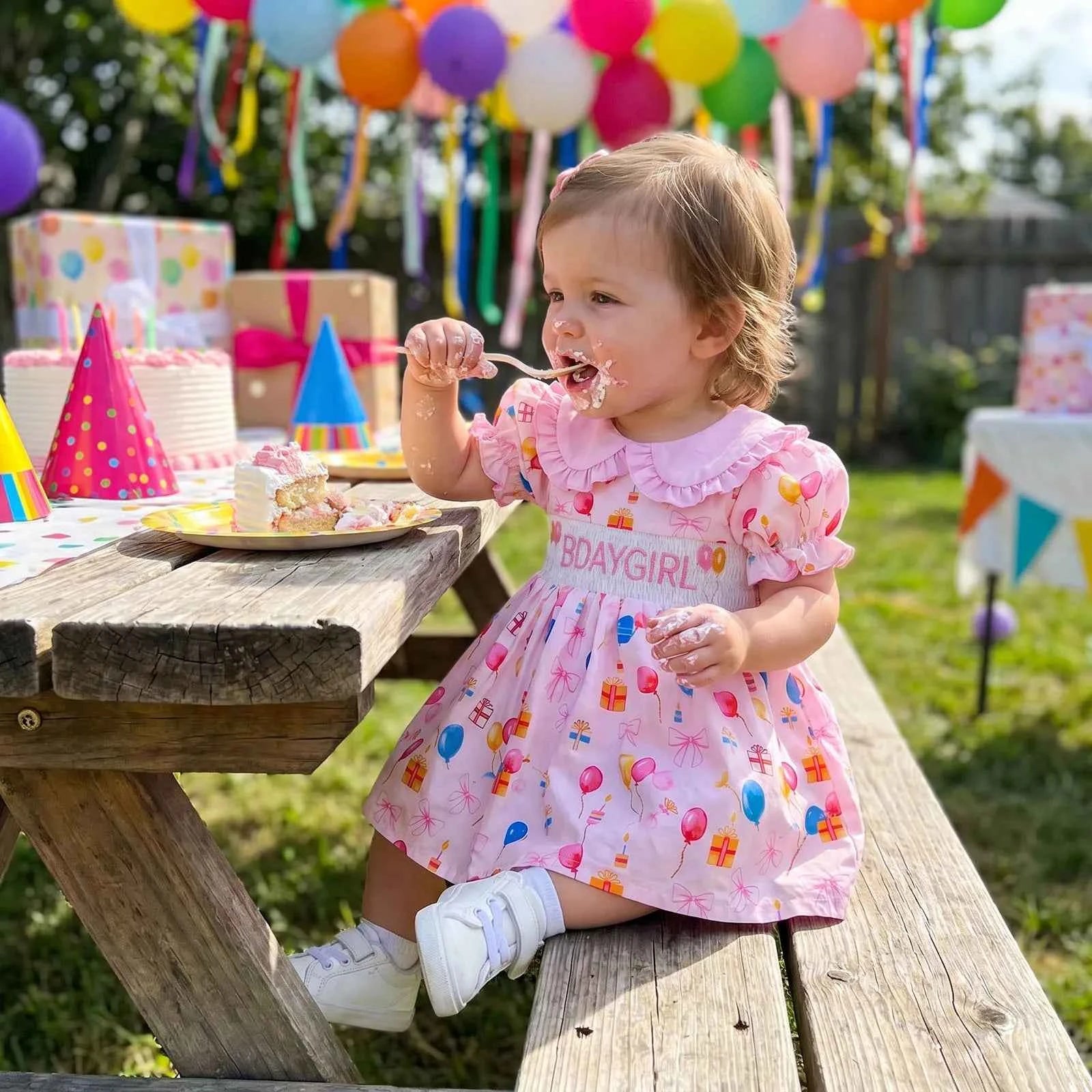 Cotton Pink Smocked Bday Dress With Balloon & Gift Print