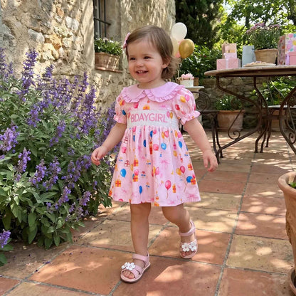 Cotton Pink Smocked Bday Dress With Balloon & Gift Print