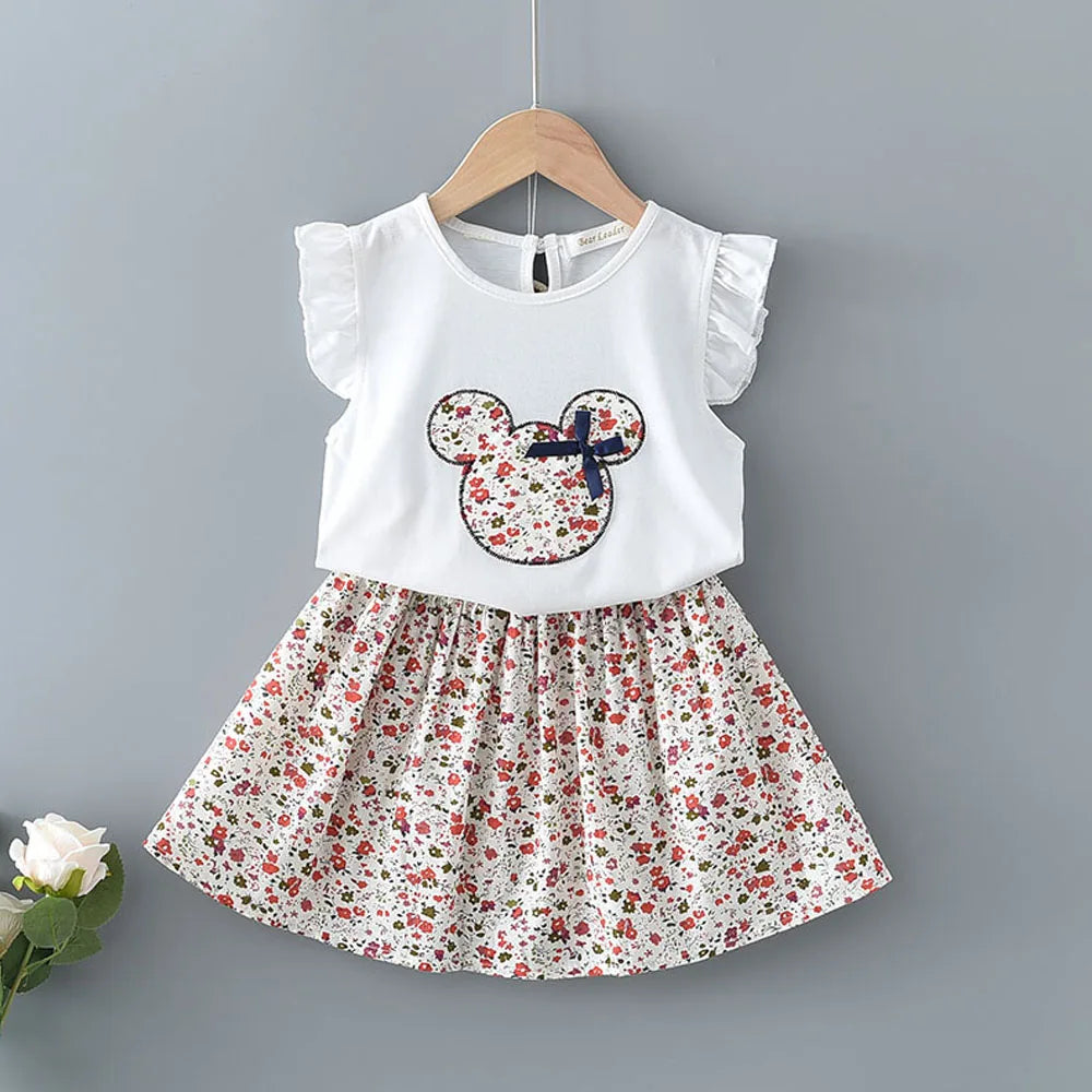 White Minnie Mouse flying sleeve top and skirt set for toddlers by Ewapi, featuring playful Disney character print.